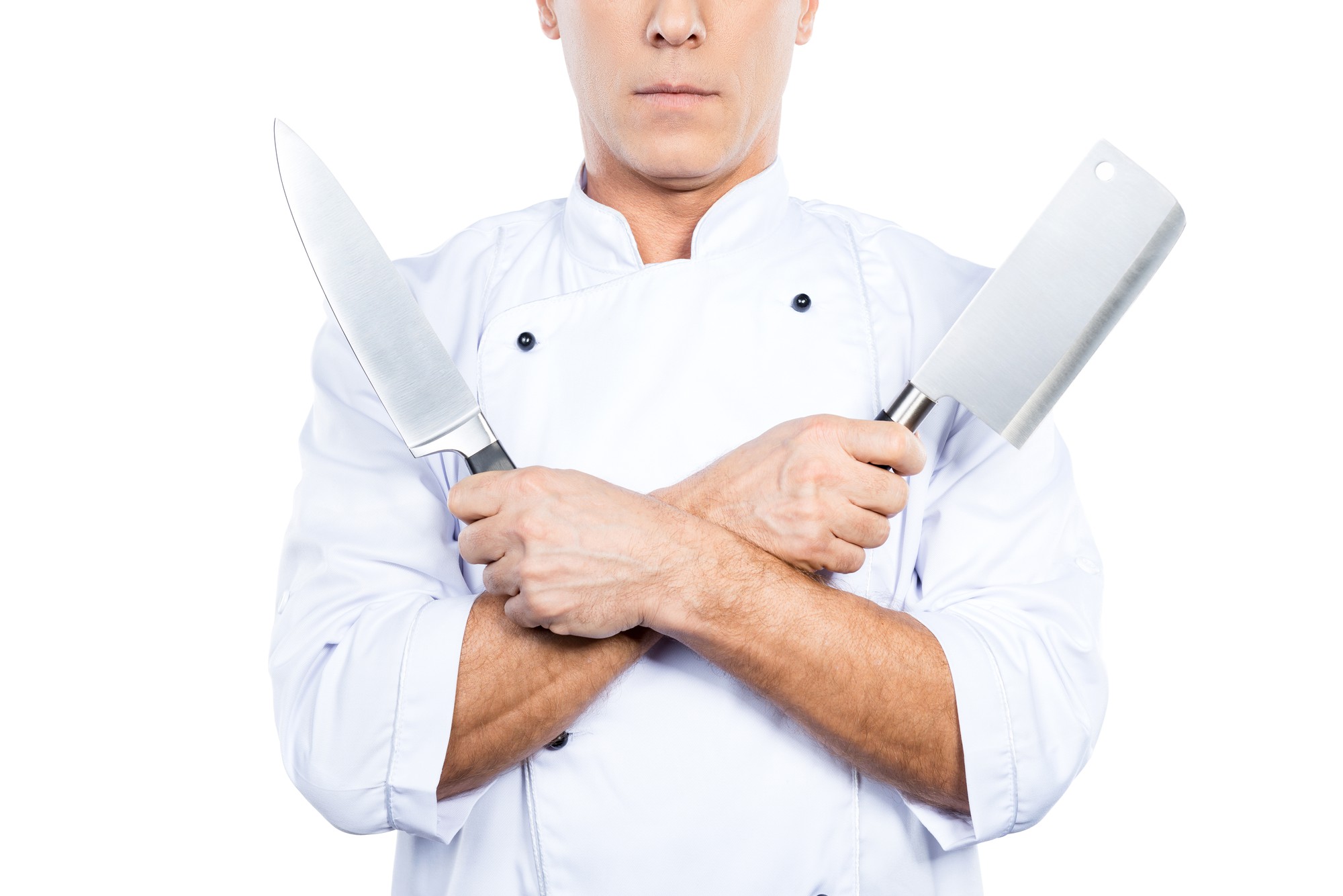 Chef che insegna una tecnica di taglio in cucina moderna